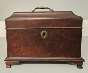 An 18th-century mahogany tea caddy